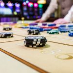 MINSK, BELARUS - FEBRUARY 2, 2017: gambling chips and cards on a game table roulette
